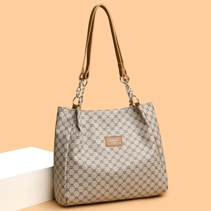 Vintage beige PU leather tote bag with geometric monogram pattern and chain handles