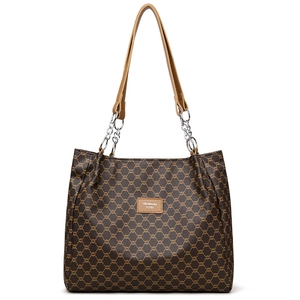Vintage PU leather tote bag with classic pattern and chain strap on white background