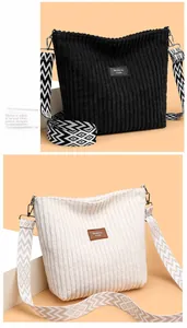 Close-up of corduroy tote bags with textured fabric and wide geometric jacquard strap