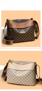 Detail view of multi-compartment printed shoulder bags with adjustable wide straps