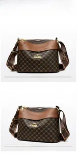 Close-up of the vintage brown crossbody bag featuring three-layer zipper and kangaroo logo