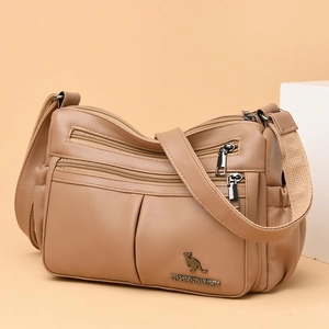 Khaki soft faux leather crossbody bag with multiple zipper compartments and wide strap