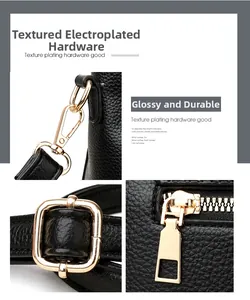 Close-up of golden electroplated metal hardware on black lychee grain leather bag