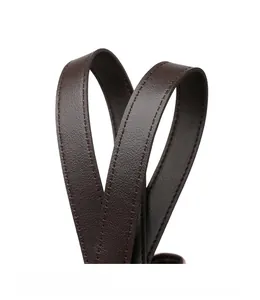 Detail of dark brown lychee leather strap with double stitching in a heart shape