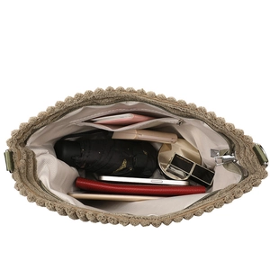 Large capacity beige knit tote bag showing spacious interior with zipper pocket and items