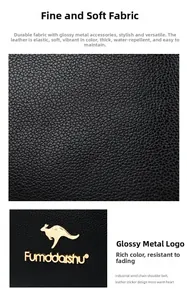 Detail of black lychee grain leather with golden kangaroo logo and premium metal hardware