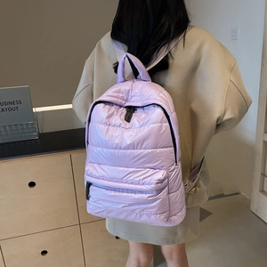 Light purple padded quilted backpack for women with large capacity and puffy satin finish