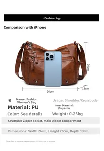 Size comparison of brown PU leather shoulder bag with dimensions 26x20x13cm