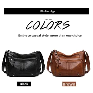 Detail of multi-zippered crossbody bags in black and brown textured faux leather