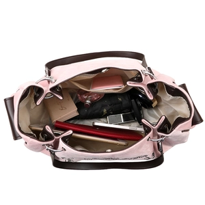 Pink large capacity vintage tote bag with brown handles showing spacious interior storage