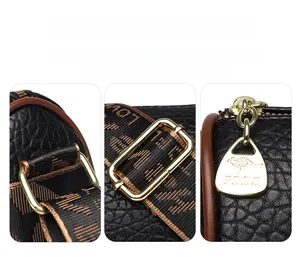 Détails de la mercerie dorée et des fermetures éclair sur un sac en cuir noir grainé