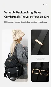 Details des gesteppten Nylon-Rucksacks mit goldenen Reißverschlüssen und Lederriemen