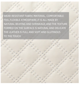 Close-up of quilted cream faux leather material with diamond stitching and soft texture