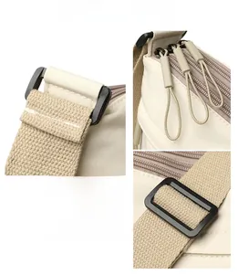 Detailed view of the water-resistant nylon texture, multi-layer zippers and woven strap
