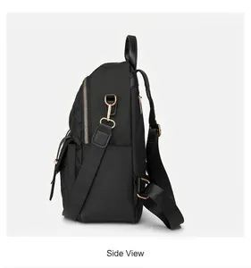Seitenansicht des schwarzen Nylon-Rucksacks mit goldener Hardware und Rautensteppung