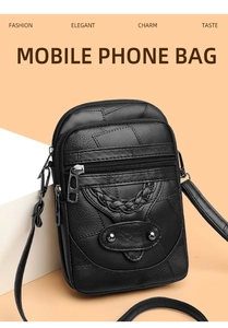 Detailed macro view of black textured leather mobile phone bag with braided stitch design