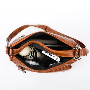 Brown vintage faux leather crossbody bag with spacious multi-zipper compartments