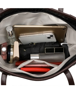 Top-down view of large tote interior with zipper pocket showing high storage capacity