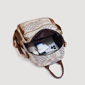 Vintage Chinese style jacquard backpack with leather straps and organized interior storage