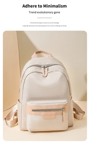 Detailed close-up of nylon backpack zippers and beige high-density fabric texture