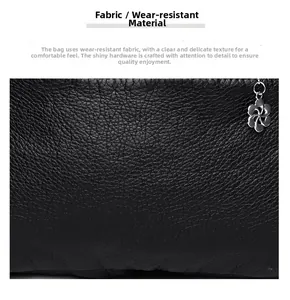 Close-up of durable pebble grain leather texture and floral silver metal zipper puller
