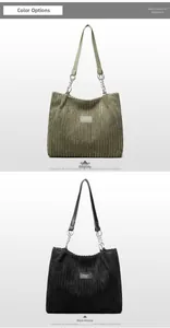 Detail view of corduroy tote bags in green and black with metal chain straps