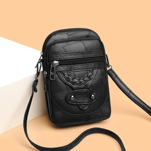 Retro black leather crossbody bag with multiple zipper layers and rivet decoration