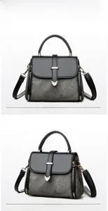 Detailed front and side view of two-tone crossbody bag with woven texture and gold hardware
