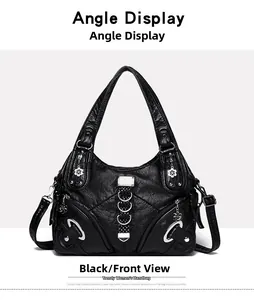 Front view of black litchi pattern PU leather tote bag with floral charm and silver rings