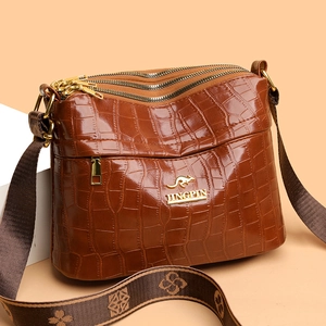 Brown crocodile embossed shoulder bag with triple zippers and floral pattern wide strap
