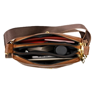 Brown multi-layer crossbody bag with three zipper compartments and floral strap