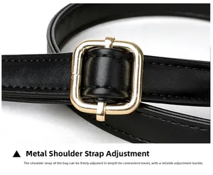 Detail of black leather strap with gold square adjustable metal buckle and fine stitching