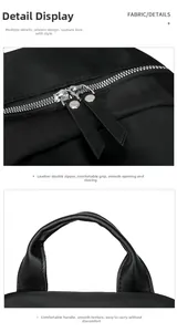Detail of nylon backpack featuring leather double zippers and a reinforced comfort handle