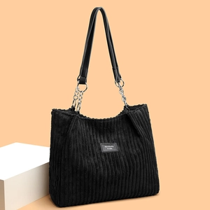 Large capacity black corduroy tote bag with chain shoulder strap and leather patch