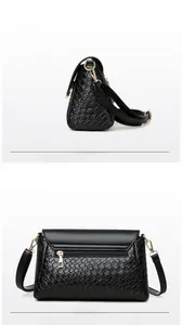 Détail de la texture tissée et de la poche zippée arrière de ce sac noir en similicuir