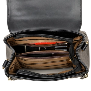 Internal view of black leather handbag featuring brown striped lining and multi-compartment storage