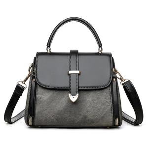 Black leather and grey fabric tote bag with gold hardware shown from the front view