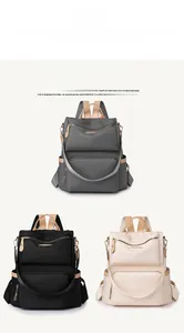 Detailed comparison of large capacity travel backpacks in grey, black and beige colors
