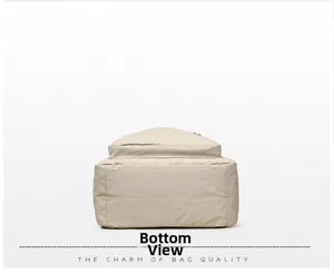 Detail view of the durable oxford cloth backpack bottom with neat reinforced stitching