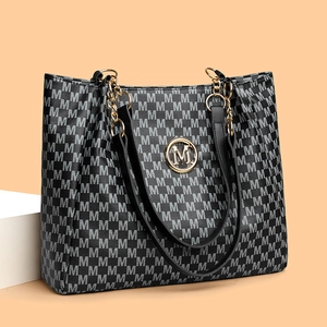 Classic black tote bag with gray M-letter monogram print and gold chain strap