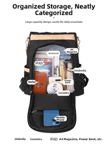 Interior view of black nylon backpack showing spacious compartments for laptop and daily items