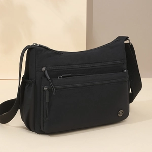Waterproof black nylon crossbody bag with multi-layer zipper pockets for women