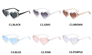 Détails de lunettes de soleil en cœur ornées de perles déclinées en six coloris variés