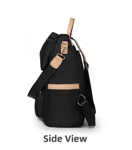 Side view of black large capacity travel backpack with brown leather trim and side pockets