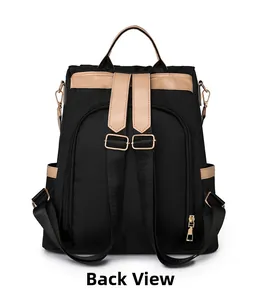 Back view of black nylon backpack with beige leather trim and anti-theft zipper design