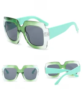 Three-way view of square color-block sunglasses with translucent frames and gray lenses