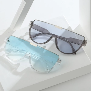 Oversized rimless shield sunglasses in blue and gray colors with a minimalist fashion design