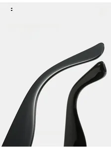 Detail of ergonomic curved black temple tips on sunglasses for comfortable wearing