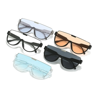 Set of oversized wrap around sunglasses with colorful lenses and metallic bridge details