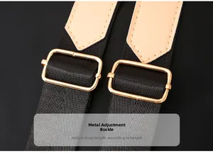 Detail of adjustable shoulder strap with gold metal buckles on a large backpack